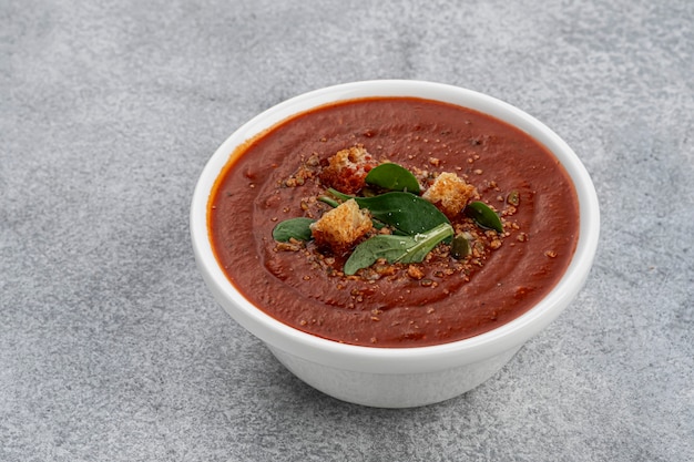 Bowl of tomato soup top view