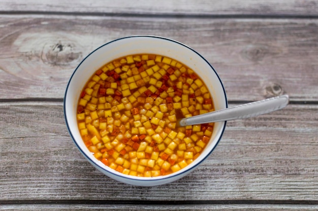 Bowl of tomato soup with croutons