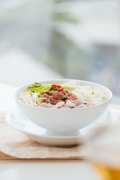 A bowl of traditional Vietnamese Pho noodle