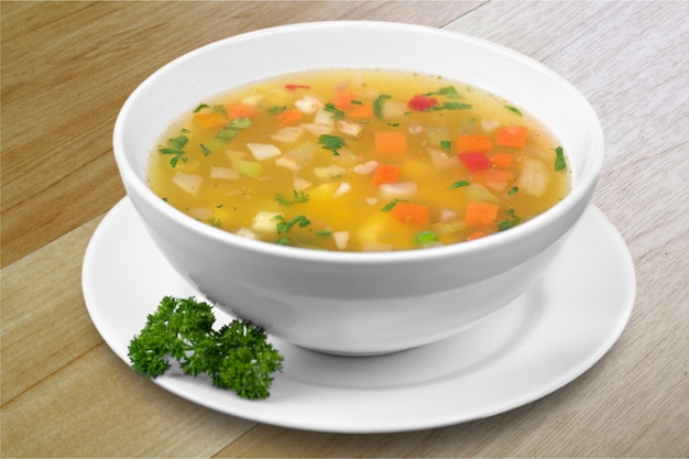 Bowl of vegetables delicious soup, close-up view