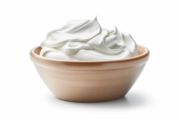 a bowl of whipped cream on a white background