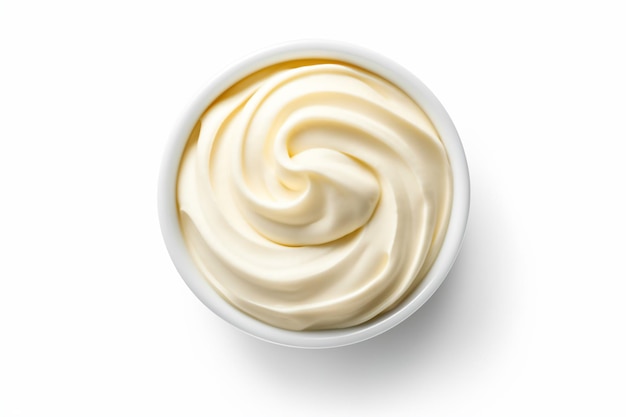 a bowl of whipped cream on a white surface