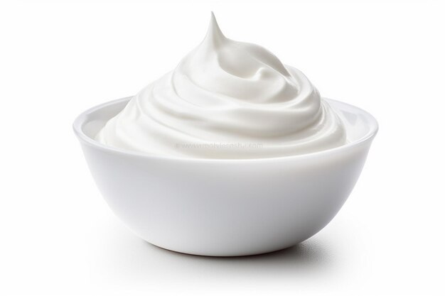 Photo a bowl of whipped cream with a white substance in it.