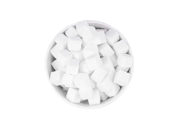 Bowl of white sugar on a white background top view