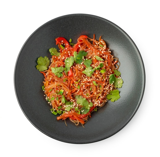 Bowl with asian wok noodles isolated on white