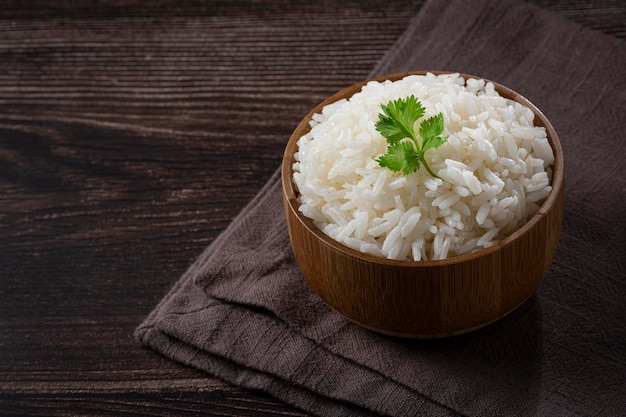 Bowl with cooked rice on the table