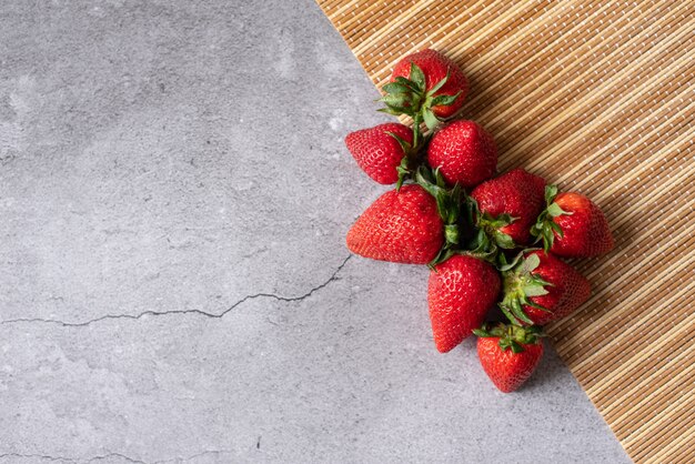 Bowl with delicious fresh strawberry on  table