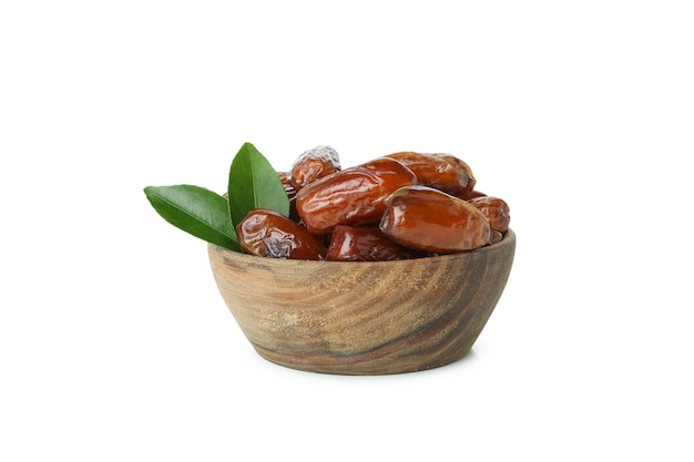 Bowl with dried dates isolated on white background