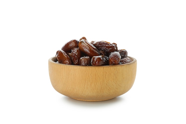 Bowl with dried dates isolated on white