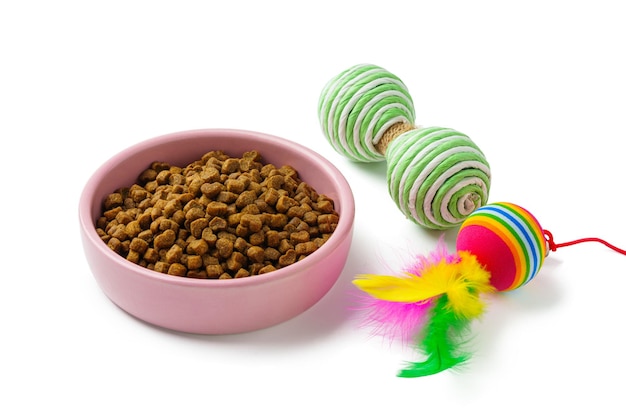 Bowl with dry pet food isolated on white background