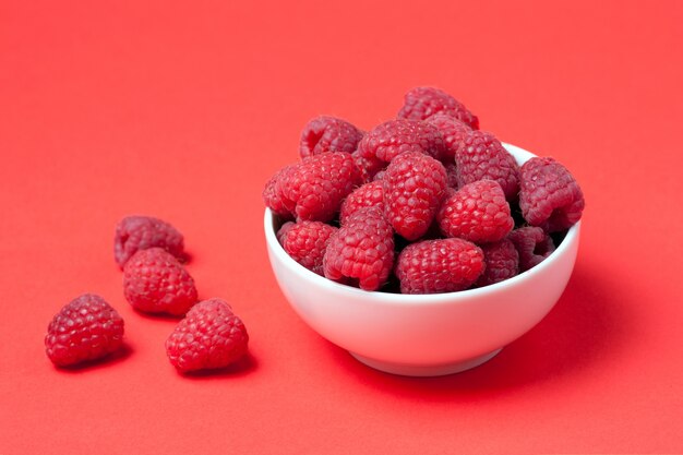 Bowl with fresh raspberries.