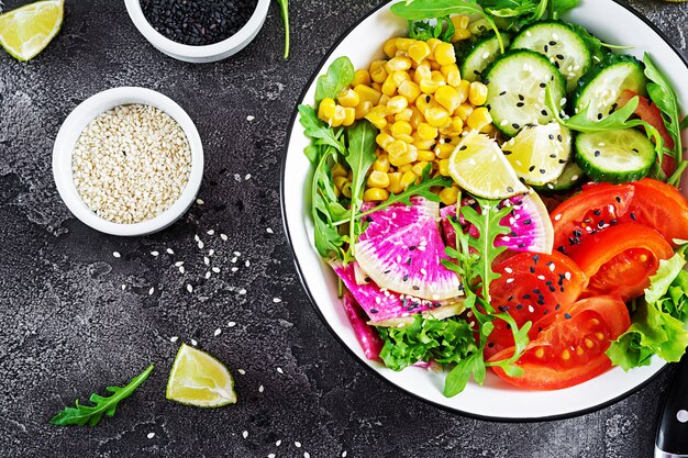 Bowl with fresh raw vegetables