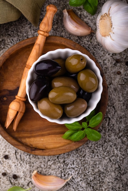 Bowl with Greek green and black olives