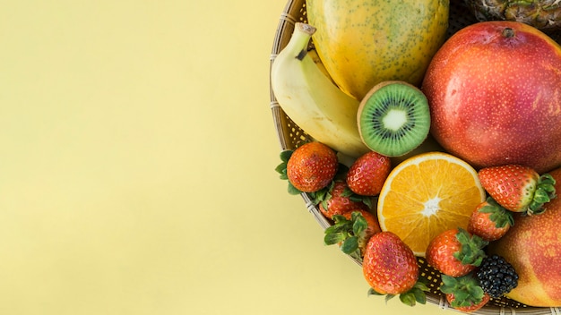 Bowl with healthy tropical fruit