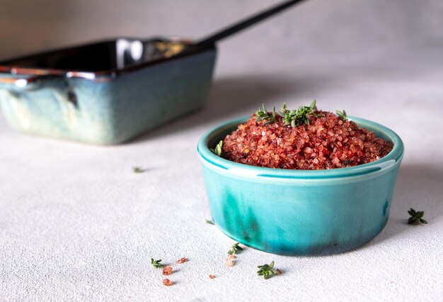 A bowl with homemade red wine infused salt Condiment to aromatize and season food