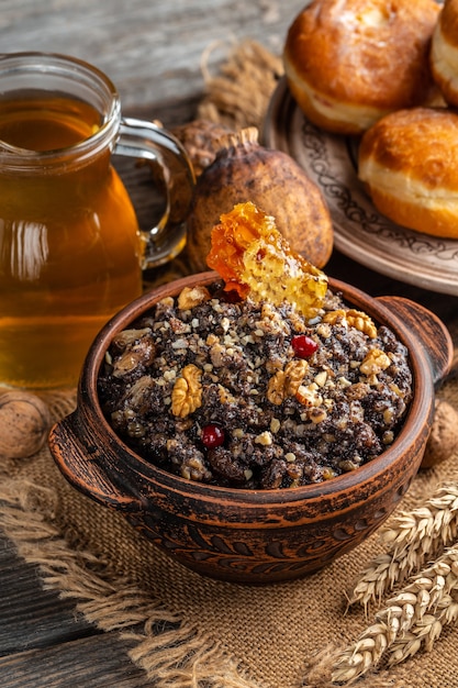 Bowl with kutia Christmas sweet meal. Boiled wheat porridge. traditional Slavic holiday ritual dish.