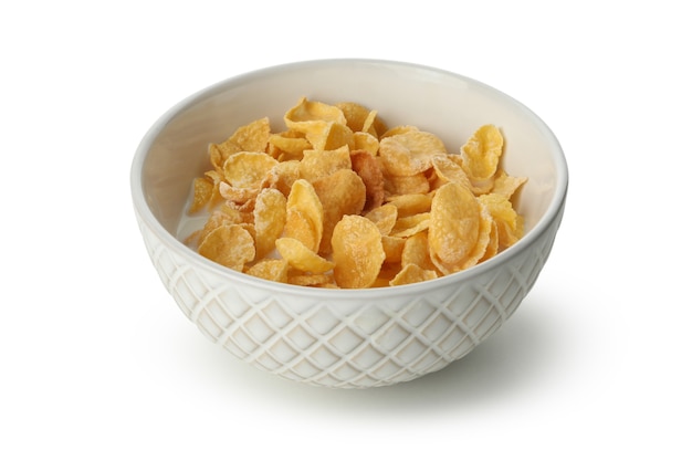 Bowl with muesli and milk isolated on white background