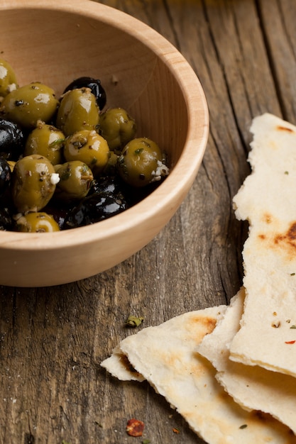 Bowl with olives and bread