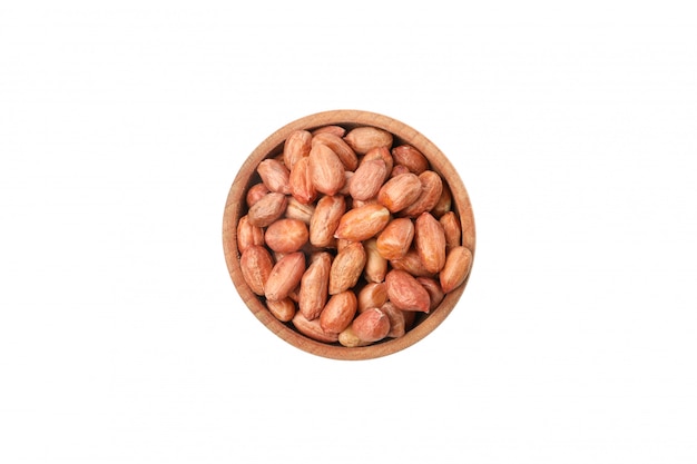 Bowl with peanut isolated on white background. Vitamin food