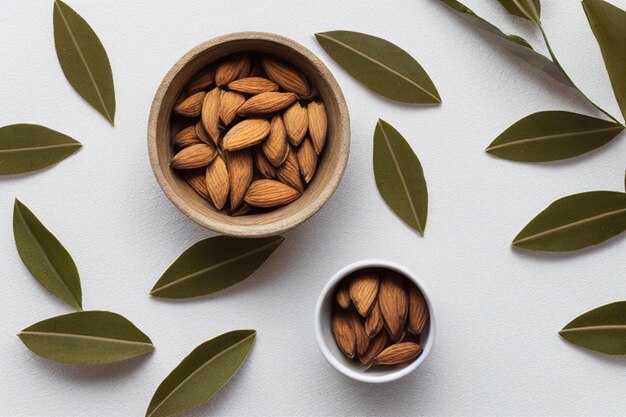 bowl with raw almonds and green leaves on a white background generative ai