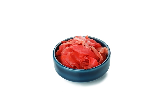 Bowl with red pickled ginger isolated on white