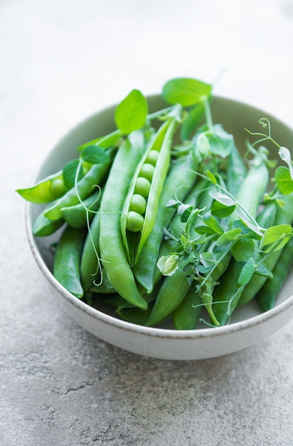 Bowl with sweet pea pods