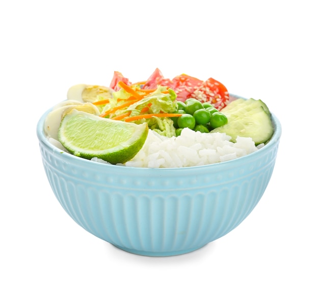 Bowl with tasty rice, eggs and vegetables on white