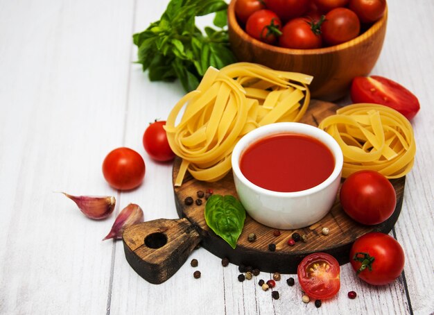 Bowl with tomato sauce