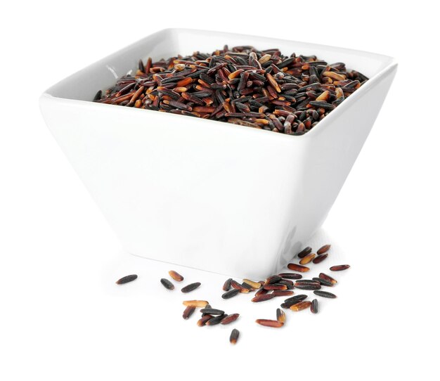 Bowl with wild rice on white background