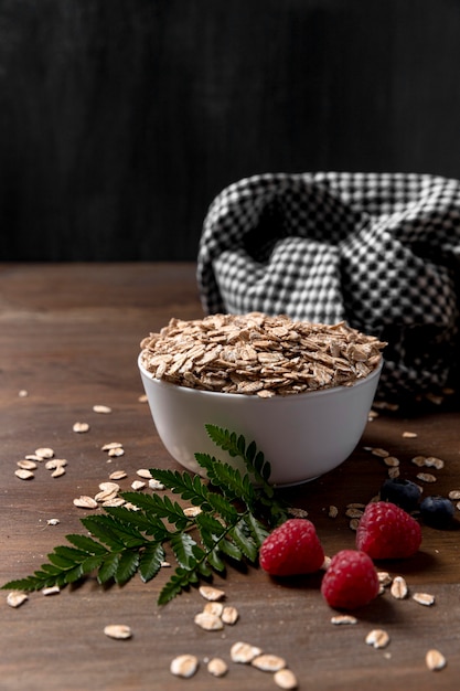 Bowl with yougurt with granola cereals and fruits