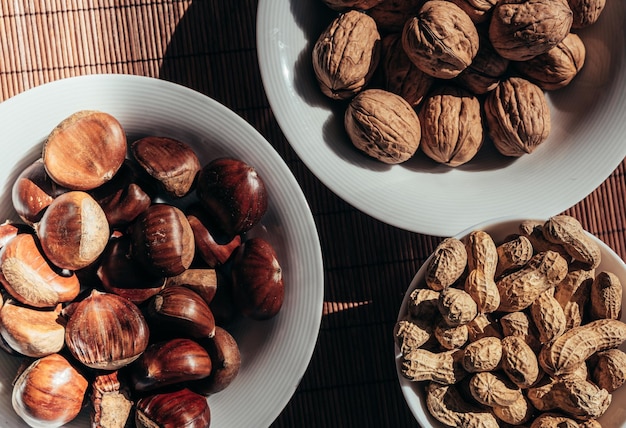 Bowls with assorted fresh nuts