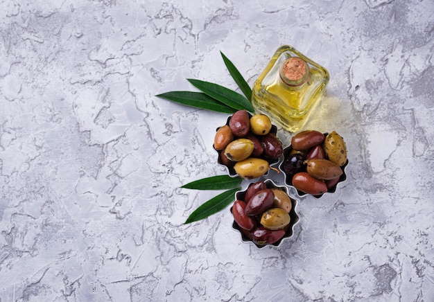 Bowls with different Mediterranean olives