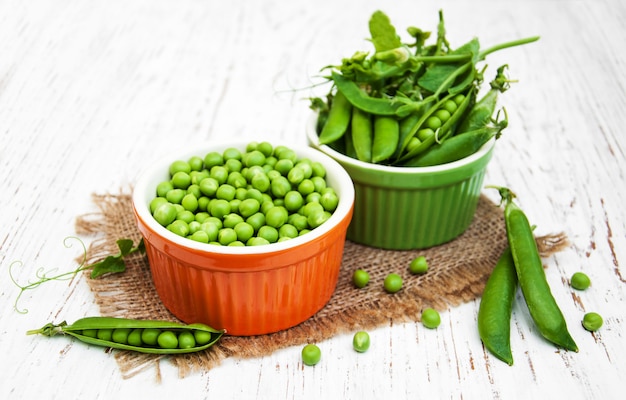 Bowls with fresh peas