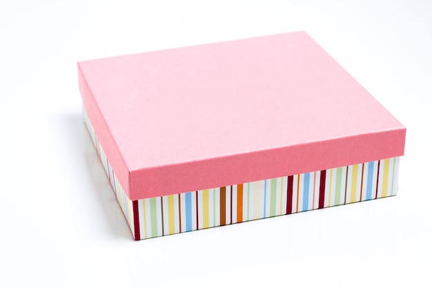 Box of assorted gourmet truffles on a white background.