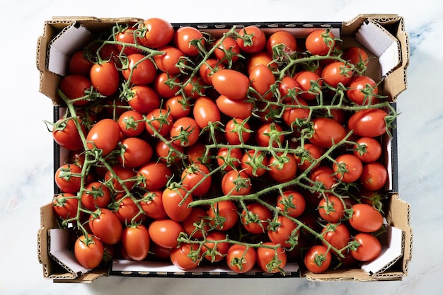 A box of cherry tomatoes on the table