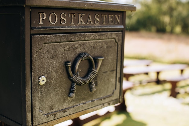 Box for letters on a tree near the house in the village