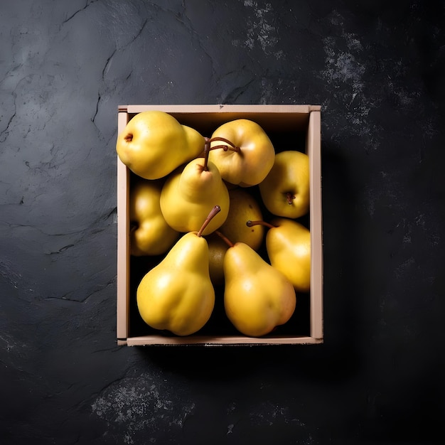 a box of pears with a face drawn on it