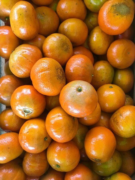 Box of tangerines for sale in the greengrocer