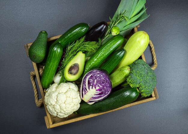 Photo a box of vegetables including cauliflower, cauliflower, and cauliflower.