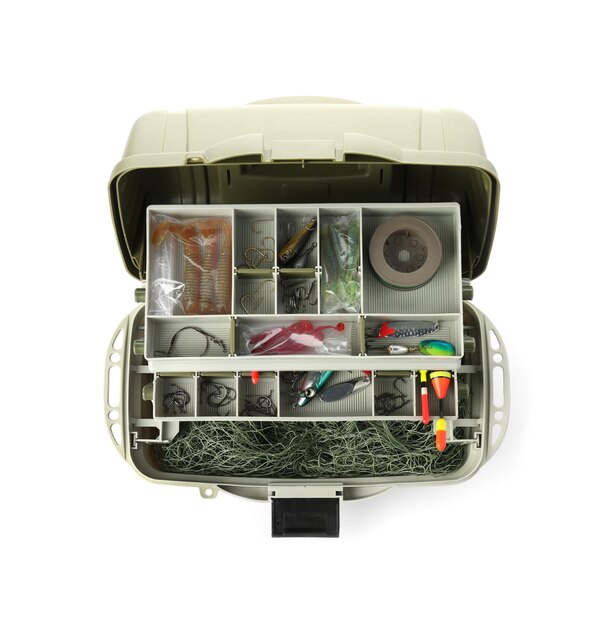 Photo box with fishing tackle on white background top view