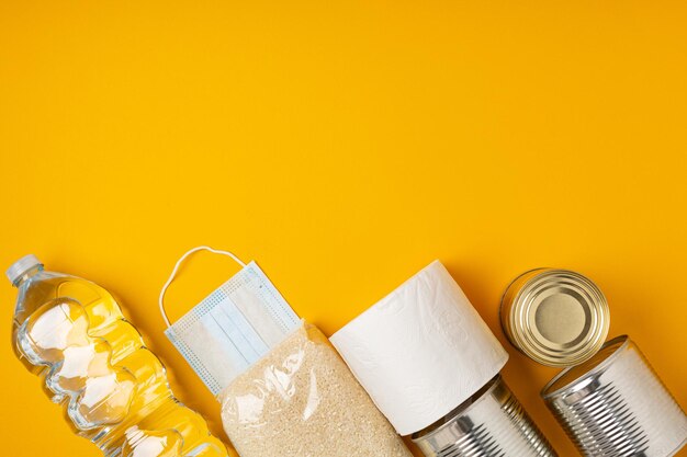 Box with food to support those in need during a pandemic disaster on a bright background