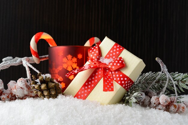 Box with a gift and New Year decorations