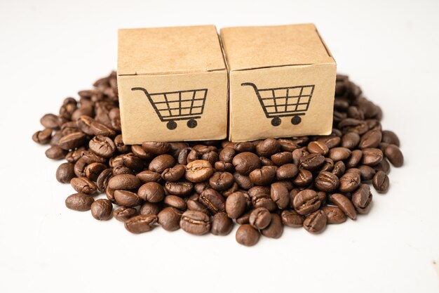 Box with shopping cart logo symbol on coffee beans, Import Export Shopping online or eCommerce delivery service store product shipping, trade, supplier concept.