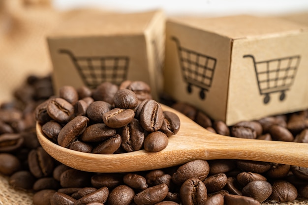 Коробка с символом логотипа корзины покупок на кофейных зернах Импорт Экспорт Покупки