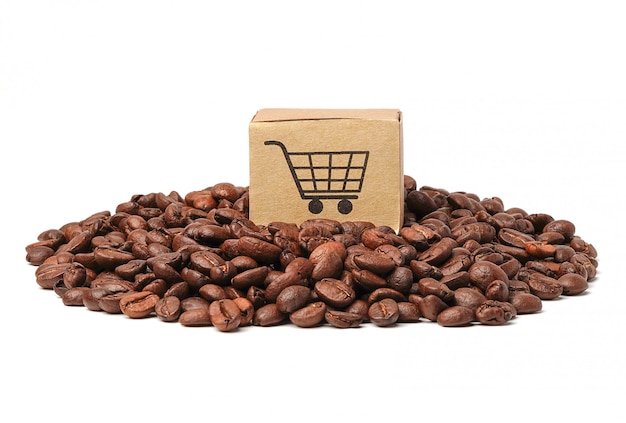 Box with shopping cart logo symbol on coffee beans.