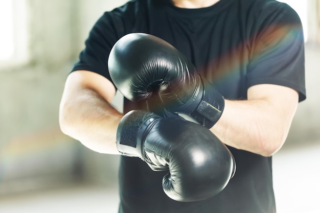 Boxer dressed in tshirt manages with