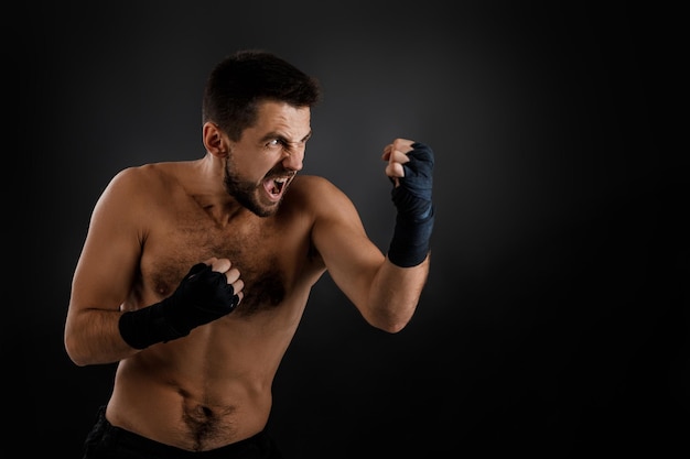 Boxer throwing a fierce and powerful punch