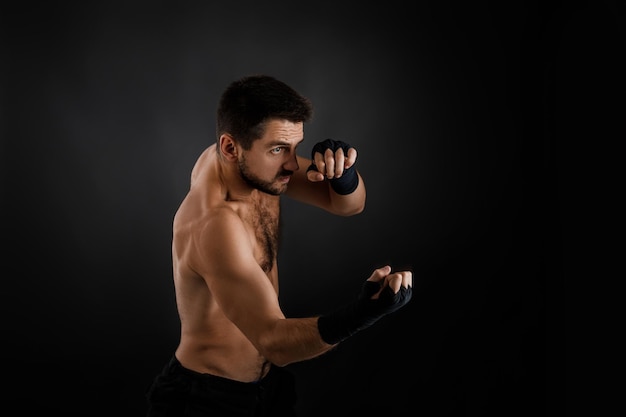 Boxer throwing a fierce and powerful punch