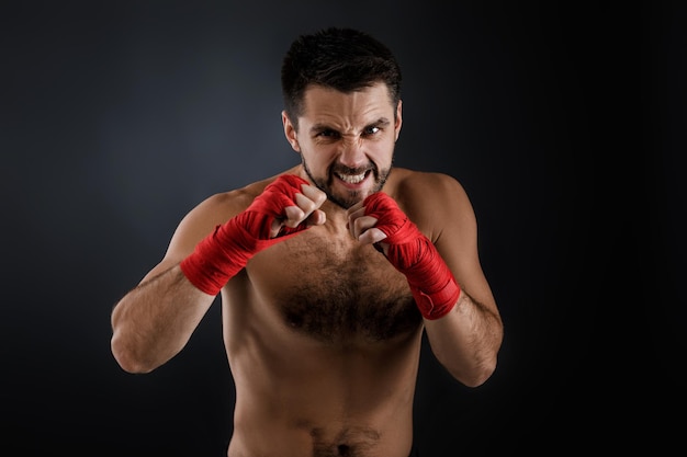 Boxer throwing a fierce and powerful punch