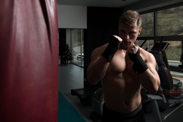 Boxer With Punch Bag In Action